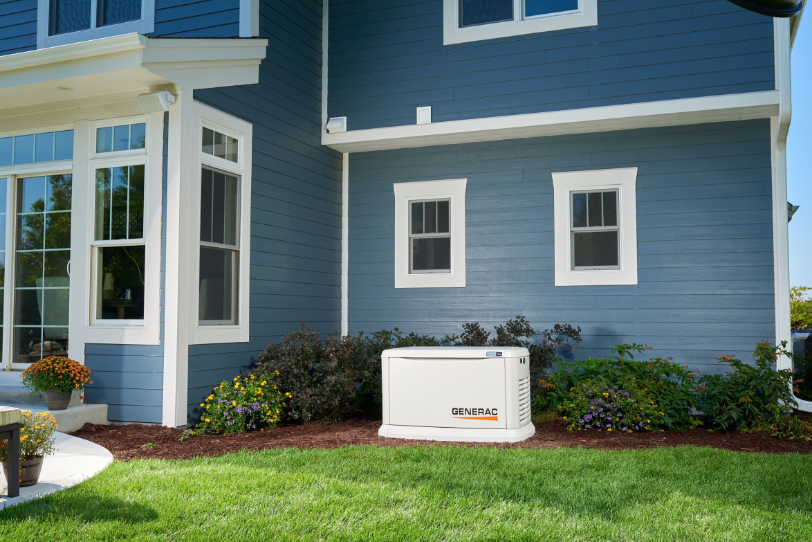 Generac home standby generator installed outside a house